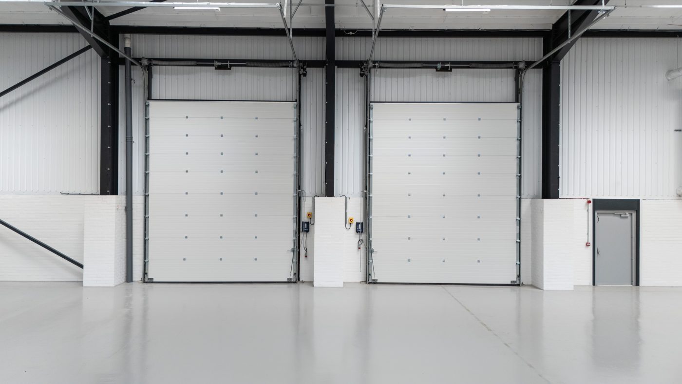 Surface level loading doors